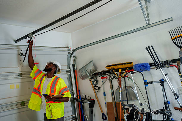 Professional Garage Door Installation technician working in Huntsville, TX